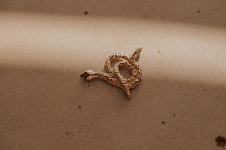 Gold snake charm for necklaces
