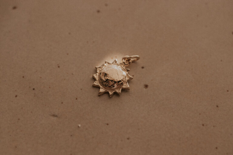 Gold sun charm for necklaces