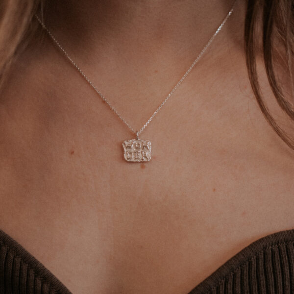 Wonder Charm aan Facet ketting - Zilver